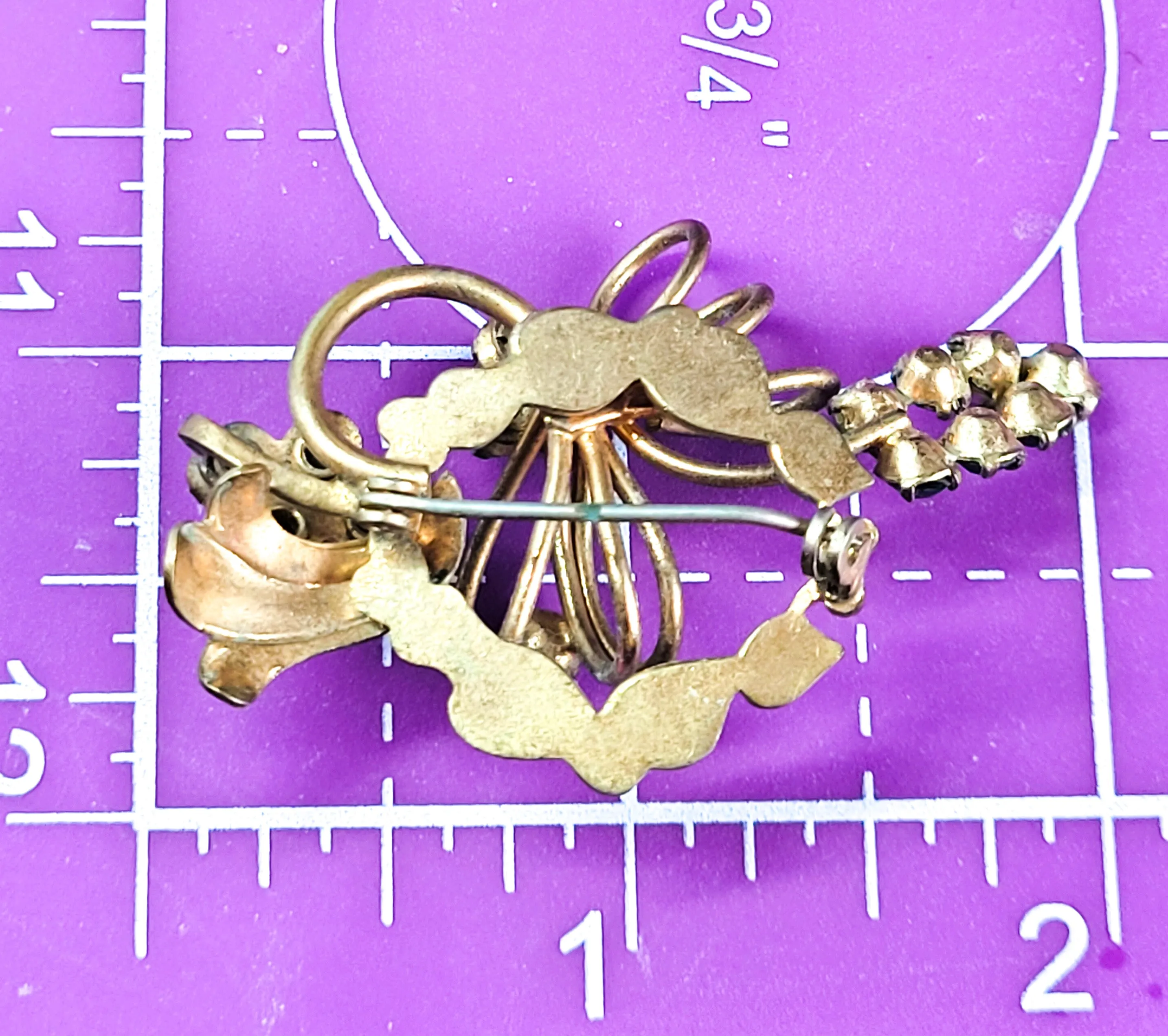 Art Deco brass and dark green rhinestone vintage holiday brooch