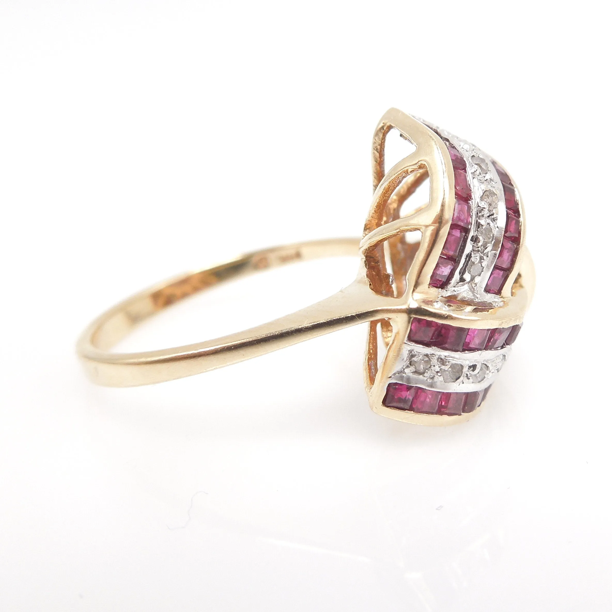 Large Ruby and Diamond Infinity Swirl Ring in Yellow Gold