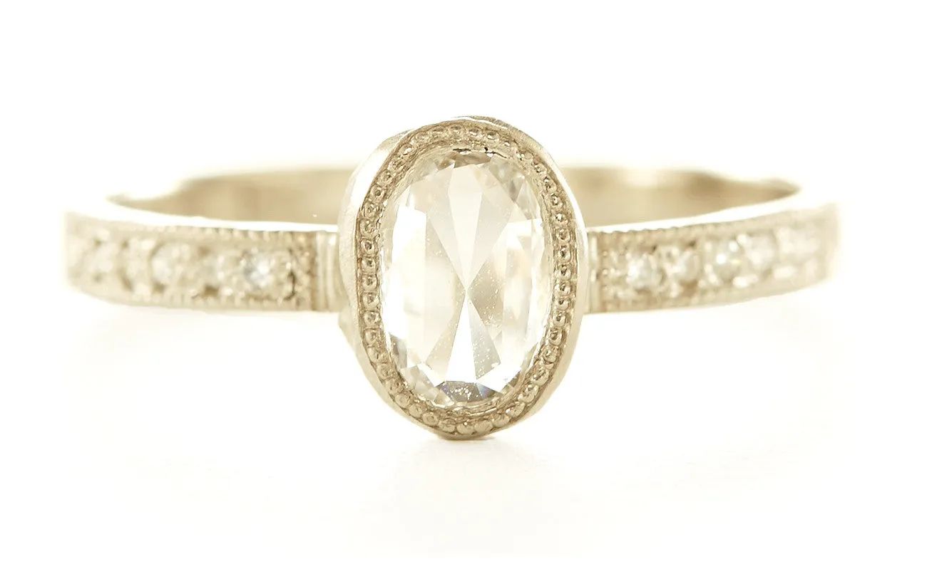 One Step Further Oval Diamond Pave Ring