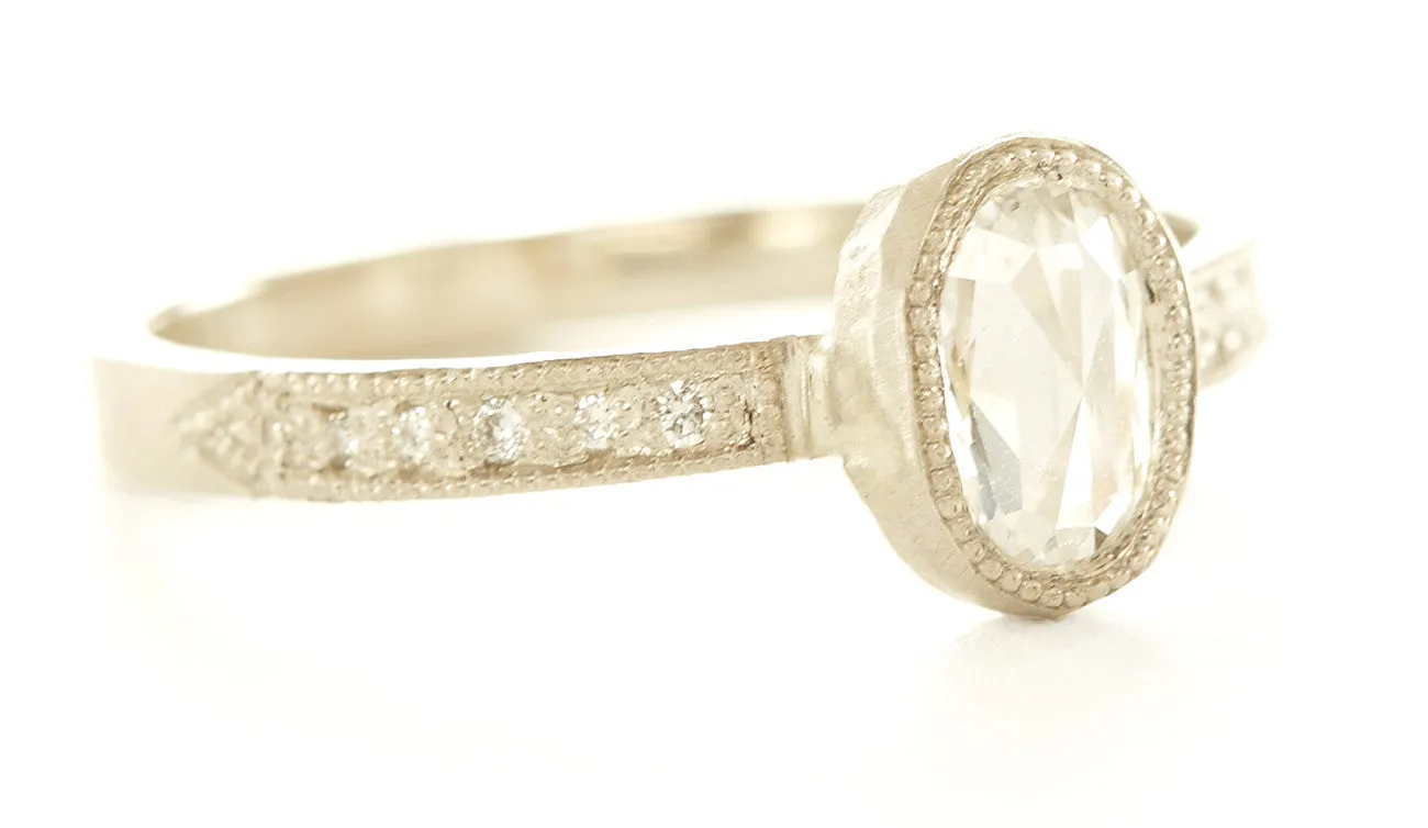 One Step Further Oval Diamond Pave Ring