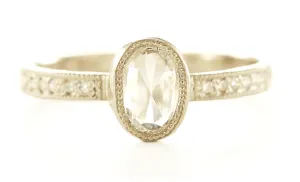 One Step Further Oval Diamond Pave Ring
